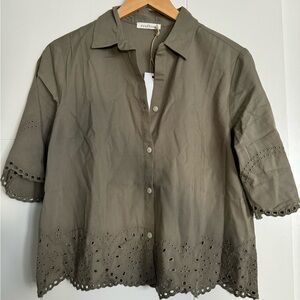 NWT sage short sleeve button down with eyelet detail on sleeves and bottom.